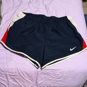 Nike Women's Navy Athletic Shorts with Red Trim